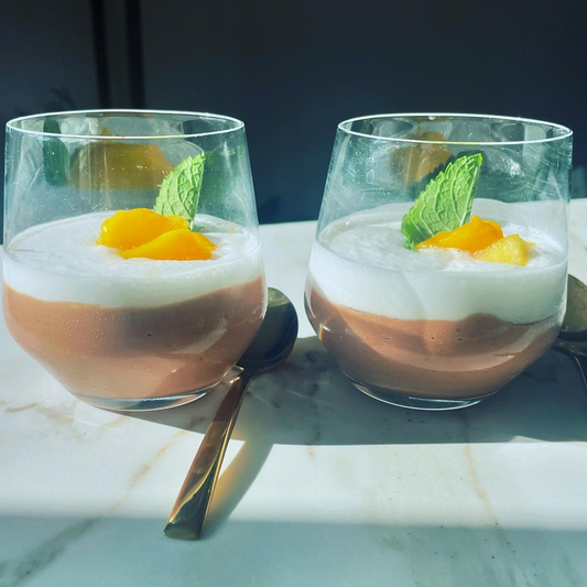 Delicious vegan chocolate mousse with mango pieces inside